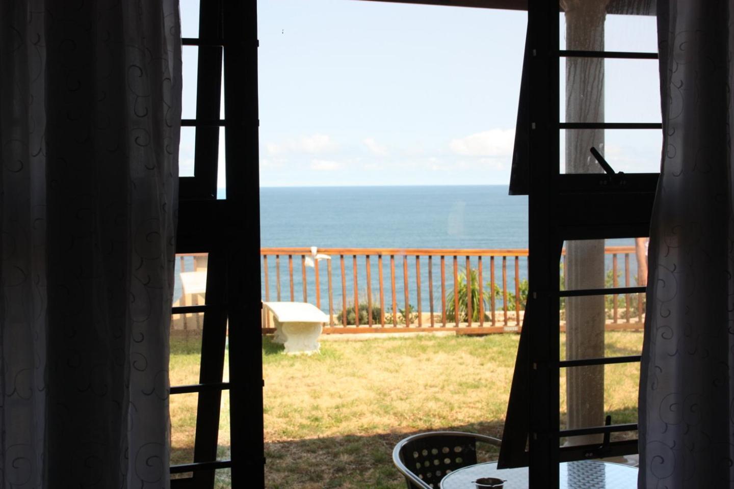 דורבן Dolphin Point B&B חדר תמונה